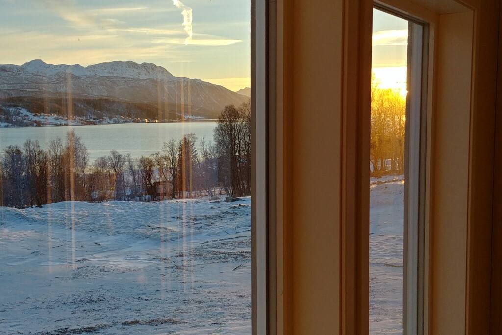 The view from the living room. The apartment is elevated somewhat from sealevel and gives a nice view of the nearby fjord.