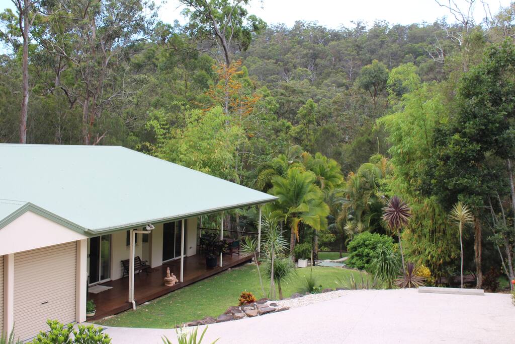 Secluded private bungalow surrounded by forest.