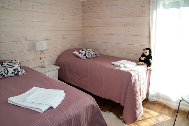 Main cabin bedroom with two beds
