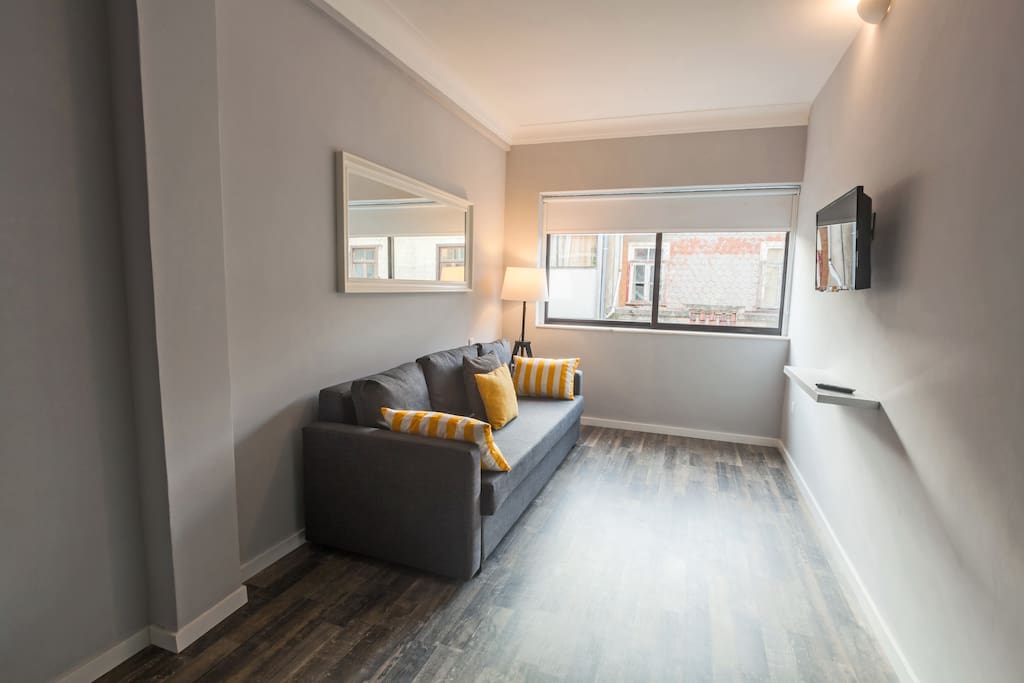 Living room with sofa-bed turns into a cozy room for 2