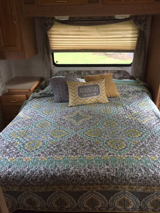 A cozy queen bed awaits a goo nights sleep in country air
