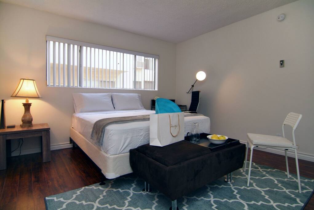 Have breakfast in bed! Serving tray and desert mocha colored ottoman make you feel like you're at the Four Seasons!