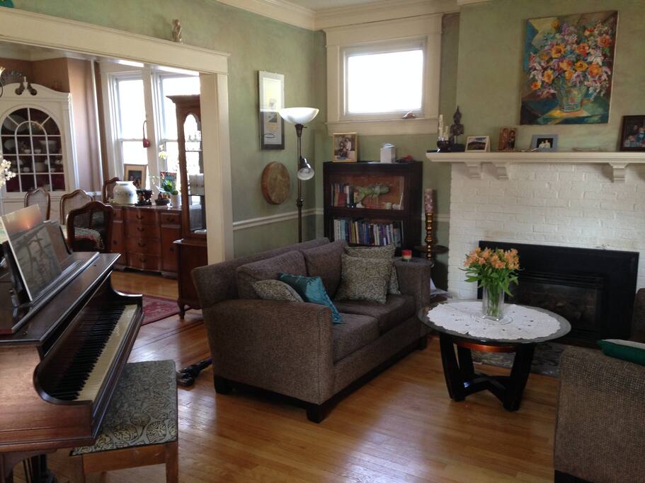 Living room with baby grand piano