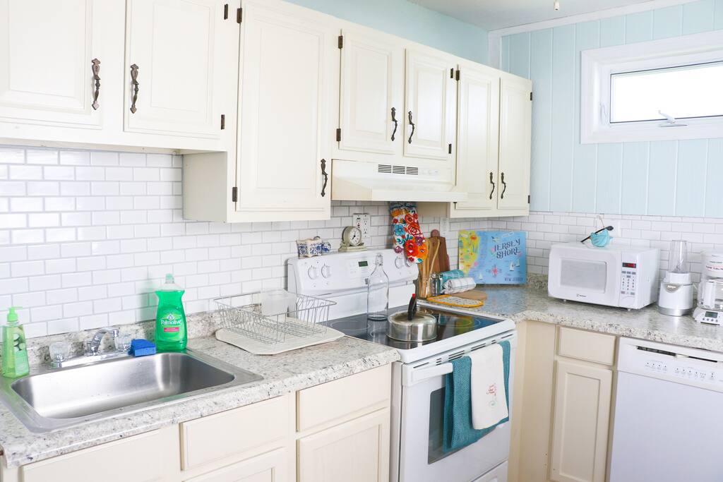 The bright and clean kitchen has all you need to cook at home if you choose