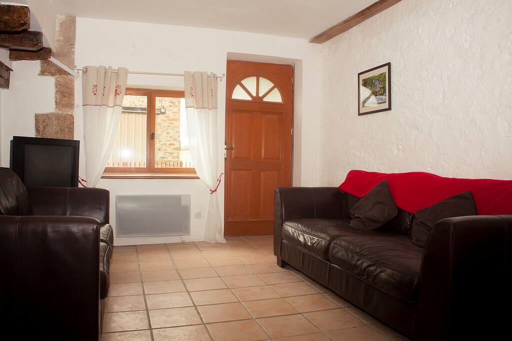 Welcome to the lounge, include French TV and comfortable leather settees.