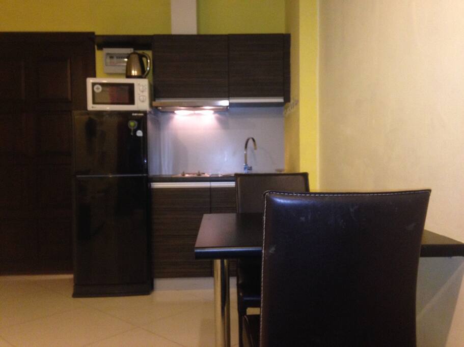 Dining and kitchen with all utensils and kitchenware