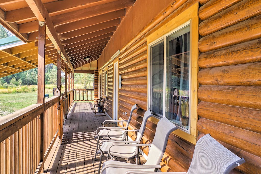 Enjoy the fresh air from this beautiful wraparound deck.