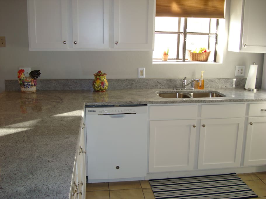 Recently updated granite countertops and fresh cabinets. Keurig and many small appliances for family convenience.