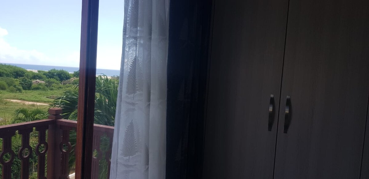 Slaapkamer met ononderbroken uitzicht op de Indische Oceaan