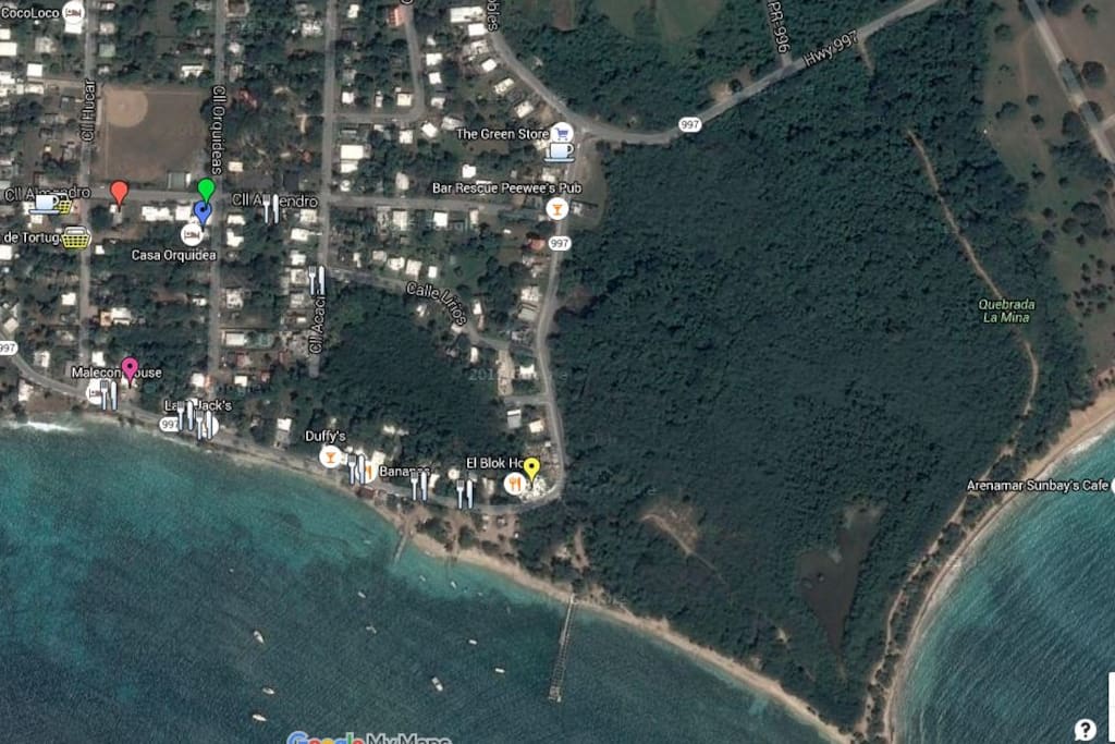 Sun Bay Beach is on the right, Esperanza Beach in the center, with two piers to snorkel. Casa Orquidea is at the blue-dot indicator, one block from the beach, with a staircase down right at our street. (AirBnB map location is not correct.)