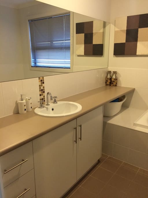 Bathroom for your own use, with bath and shower.