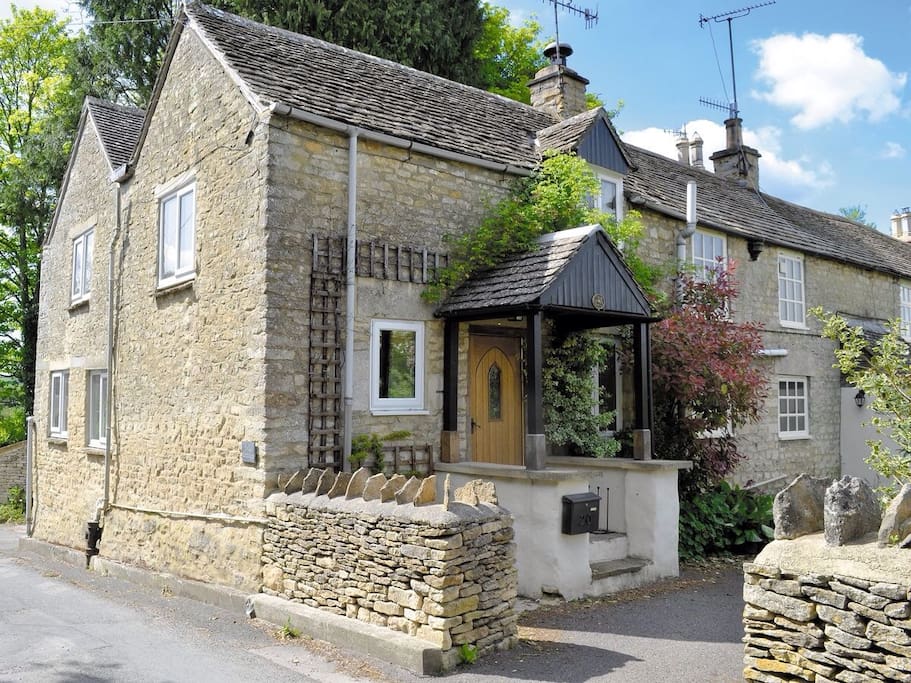Folly Cottage front and side on quiet small road.