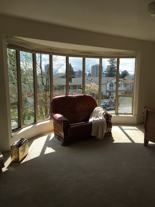 Enjoy sitting in the sun with the floor to ceiling windows