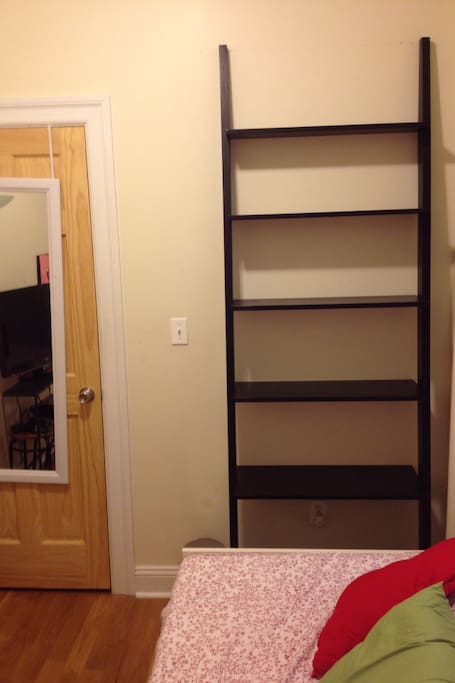 Your bookshelf to put up any personal items you like to travel with. Eg. photo of family or pets, makeup etc.