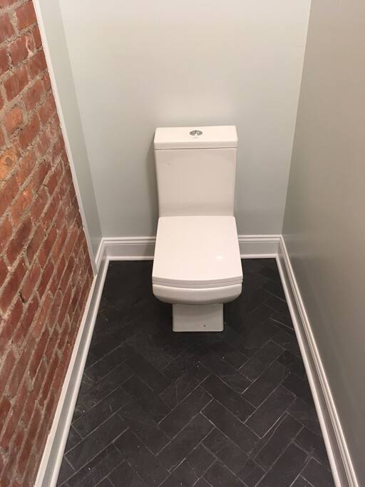 New and stylish 1/2 bath on the main level.