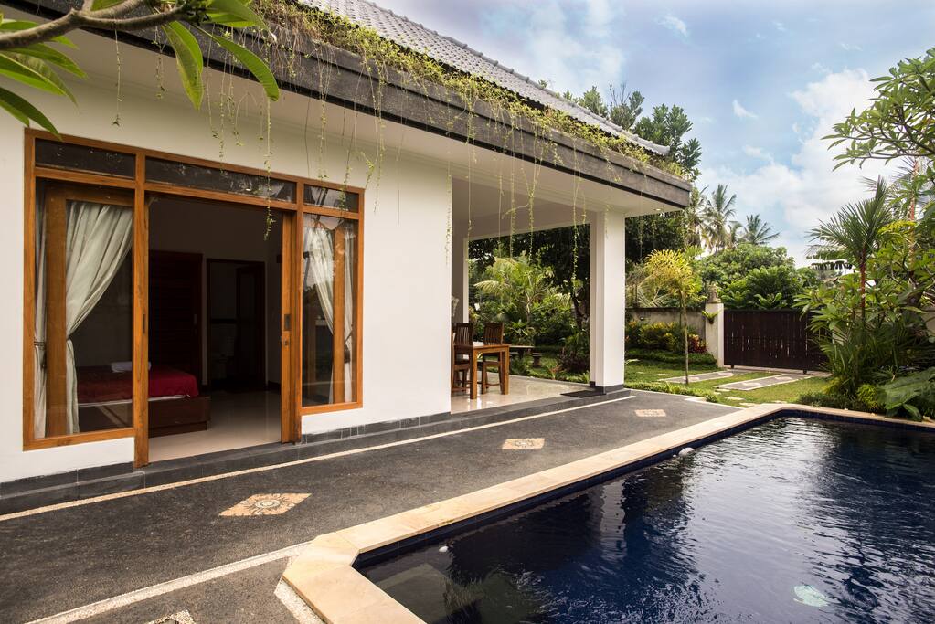 The pool and the doors to the bedroom