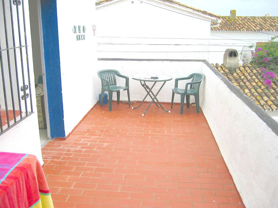 The sunny private patio. South facing and wonderful views of sunsets.
