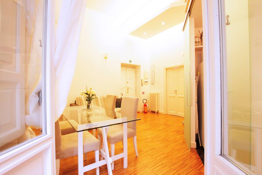 Spacious and comfortable living room with dining area.