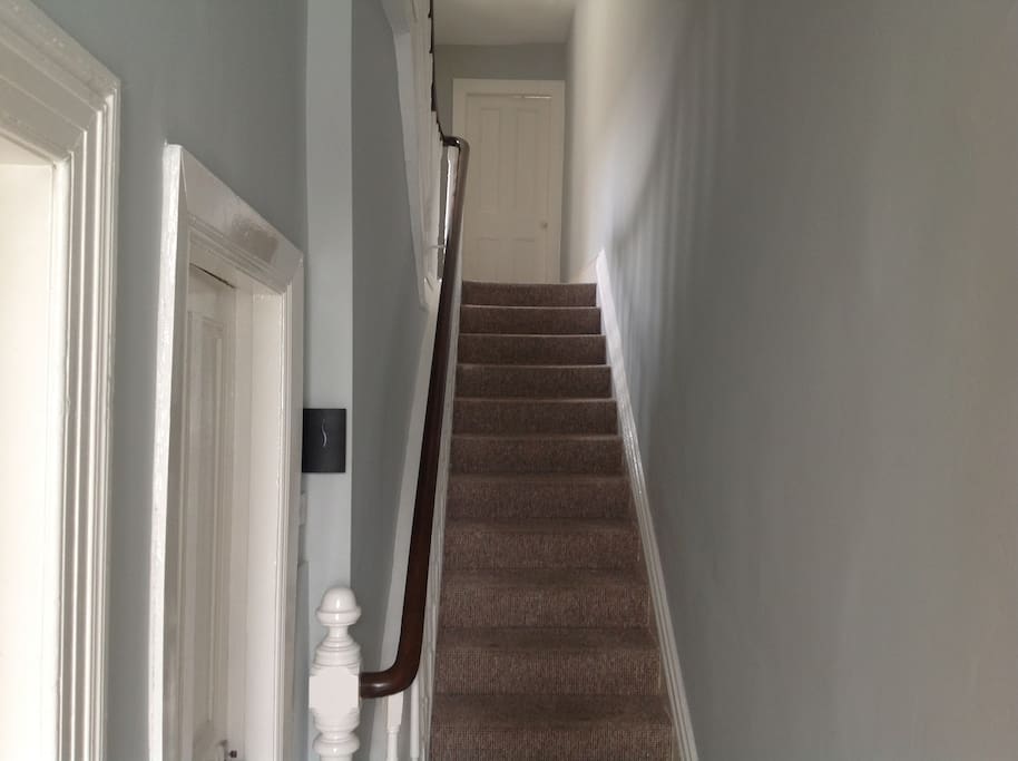 Landing to first floor leading to double room