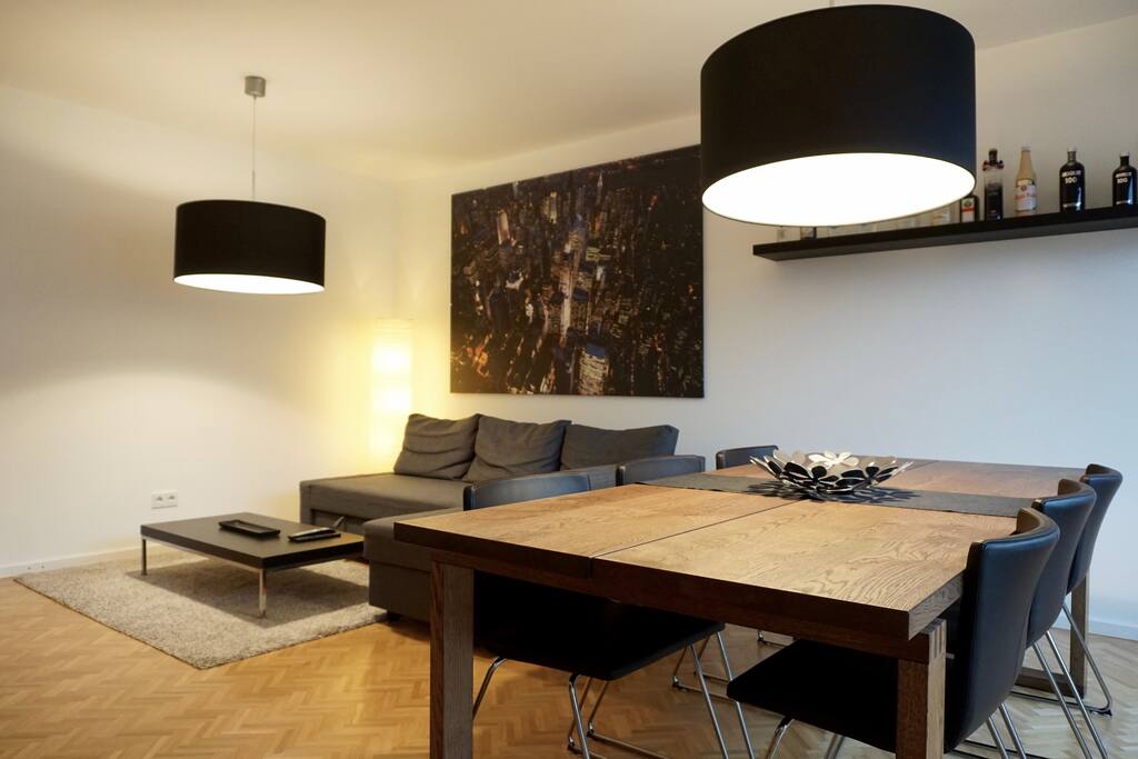 The cozy living area is perfect for relaxation after a busy day in the city.
