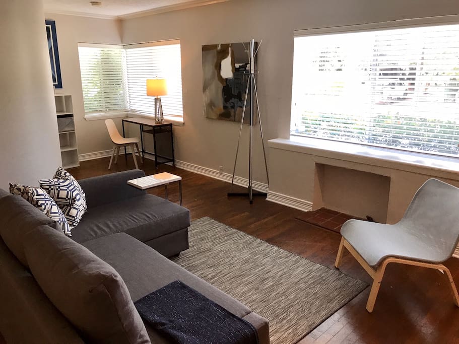 Living area with corner office/study area.