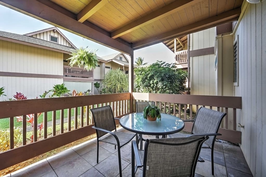 The ground-floor unit features a private lanai with a Vornado air circulator.