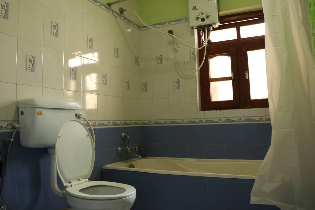bathroom with shower and toilet.