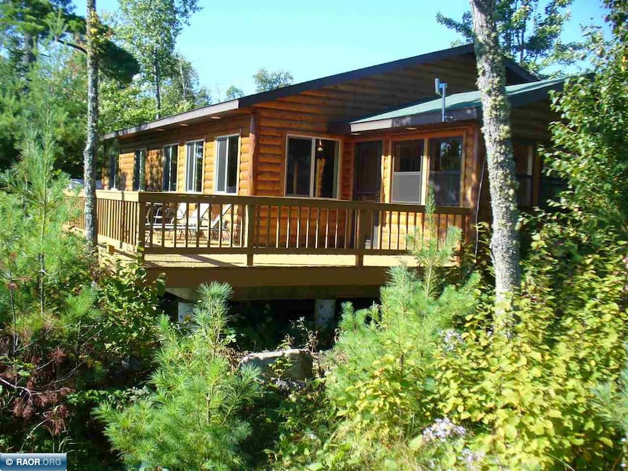 View of the back of cabin. Your view would be of the lake and trees.