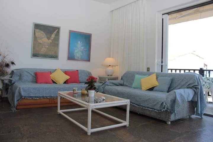 Sala de estar dos sofás cama