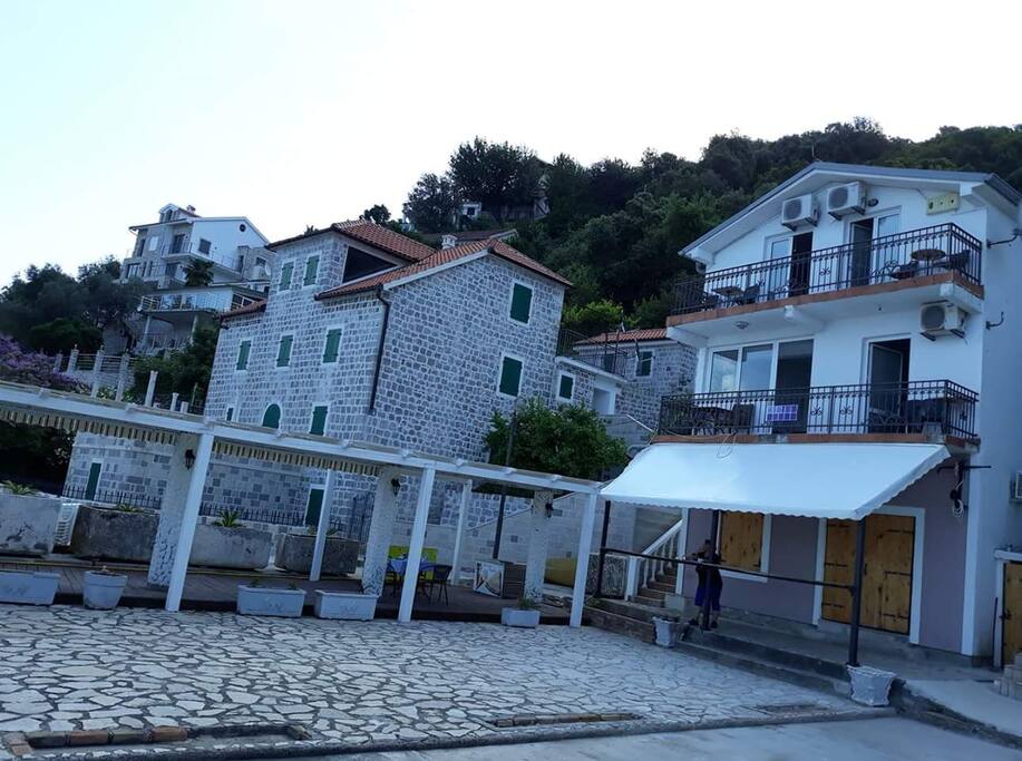 Front view of Violet Apart Building and downstairs Konoba Zeytin Restaurant.