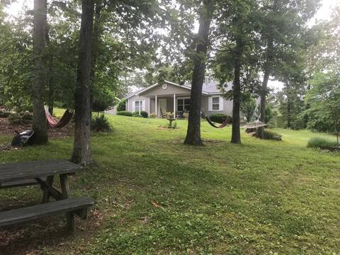 River front property, HOT TUB, Kayak, and tubing.