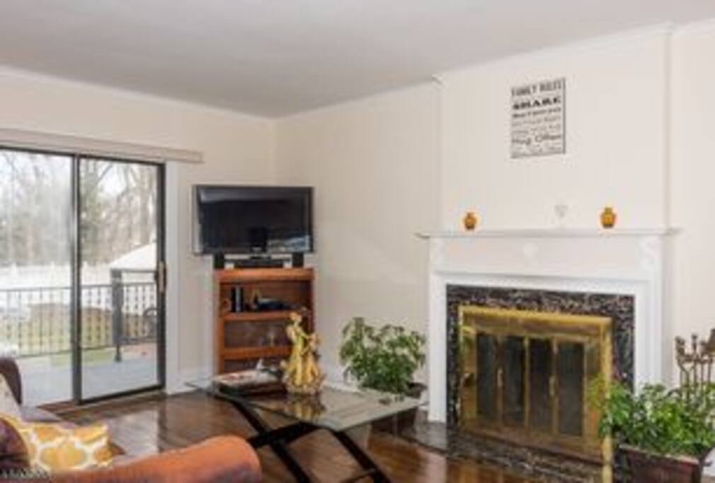 Shared Living room with fireplace.