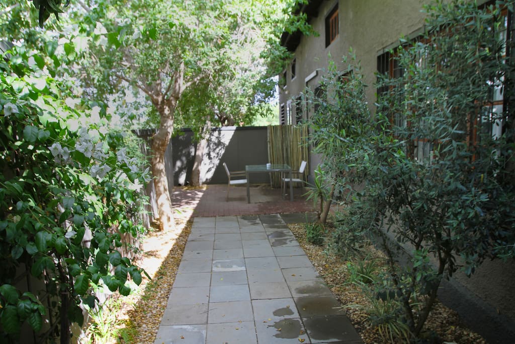 Outside area with dining table.