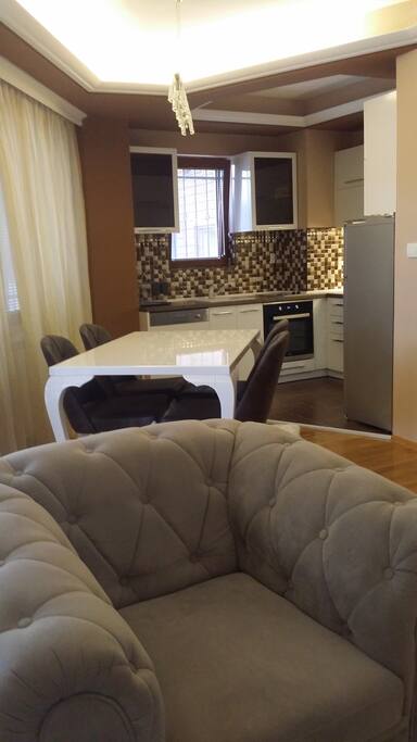 Kitchen adjacent to living room