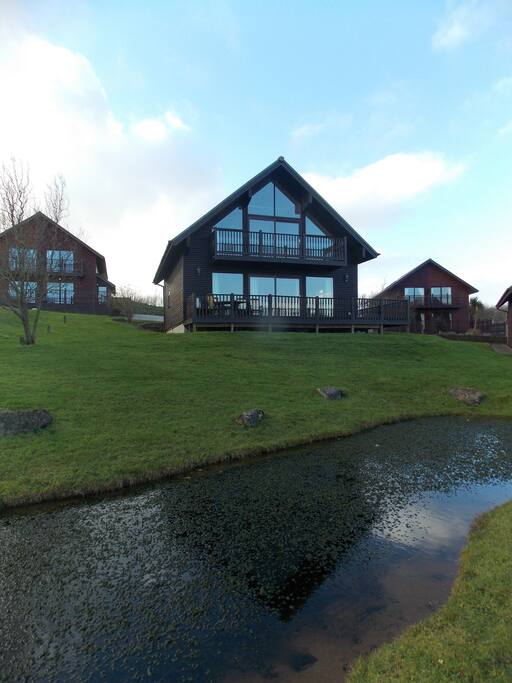 Front aspect across pond