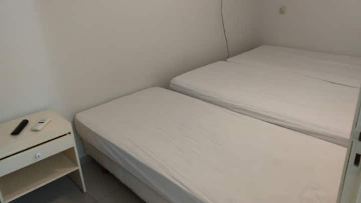 ห้องพักพร้อมเตียงเดี่ยว 3 หลัง