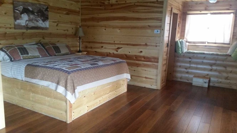 King bed, built in night stands & lamps on each side of the bed. Window seat to relax & gaze out.