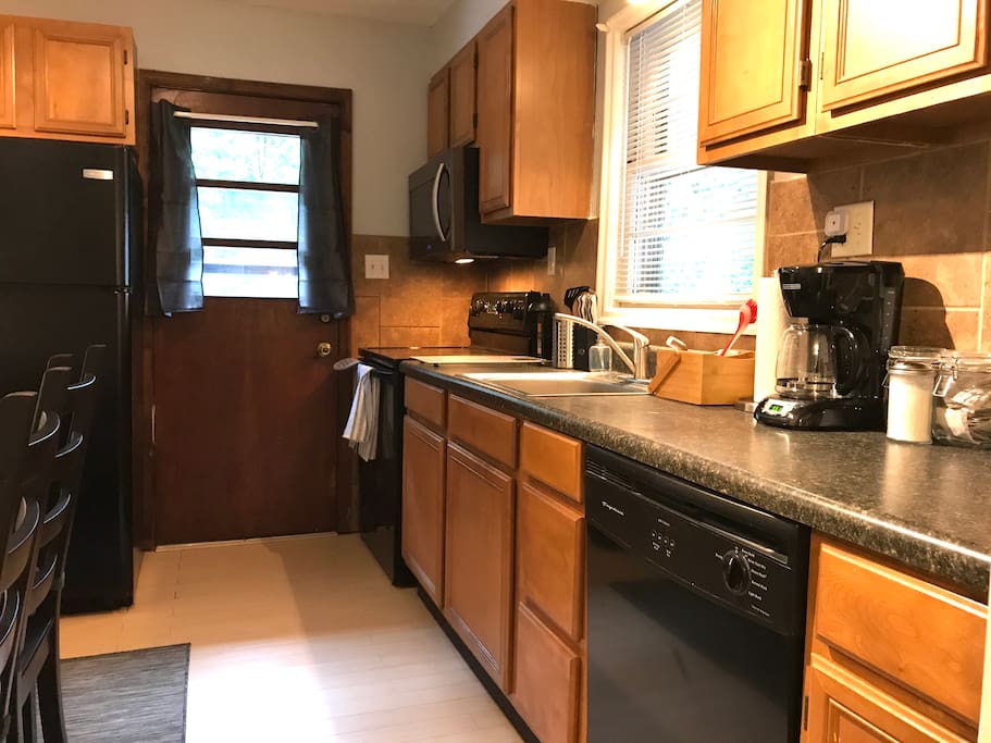Kitchen with appliances and plenty of counter space.