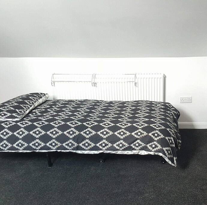 One of two extra beds available if need be. We can fit the double bed and a single comfortably plus a second single at a squeeze!