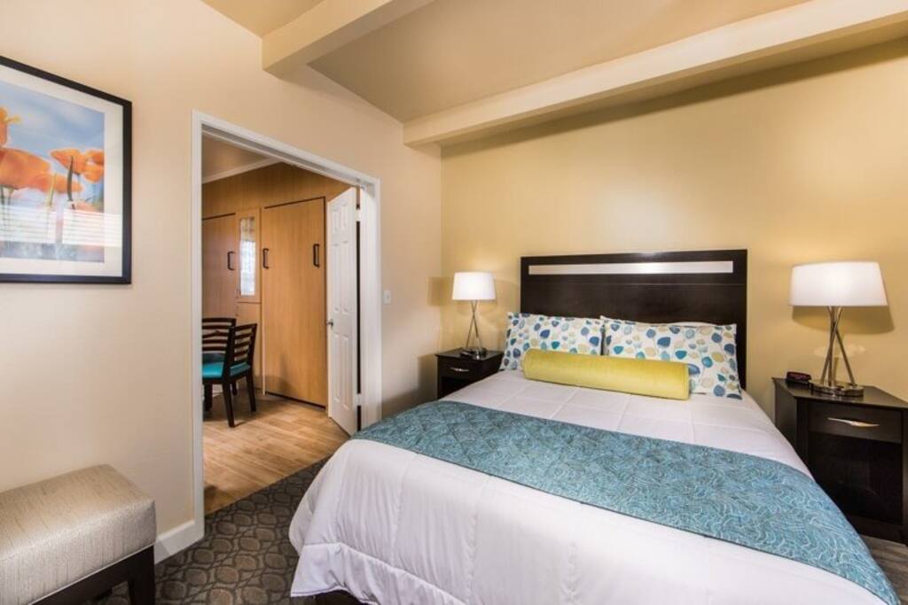 Queen bed in separate room, plus two twin sized beds in separate room