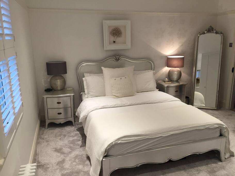 Large bedroom with plenty of floor space for a double mattress or travel cot etc