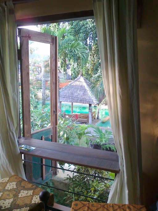 French balcony with view over pool area