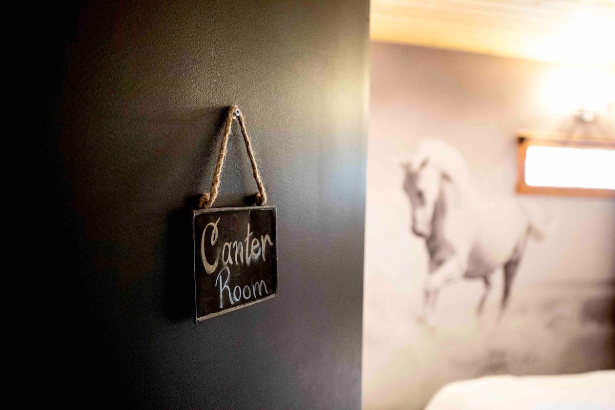 Canter Room with white horse mural and private ensuite 