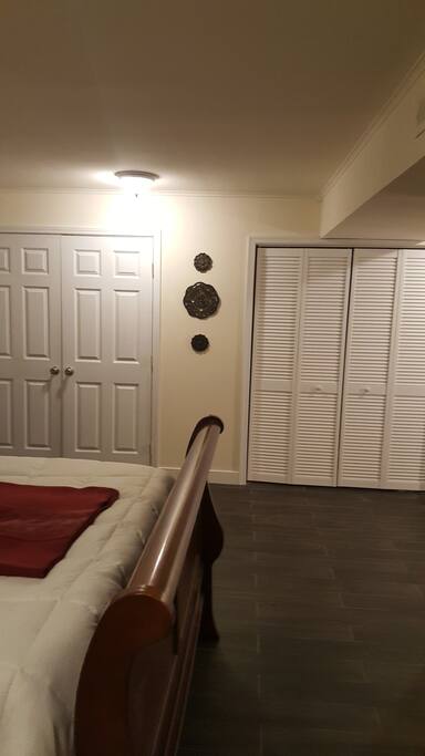 Bedroom showing closet and HVAC unit.