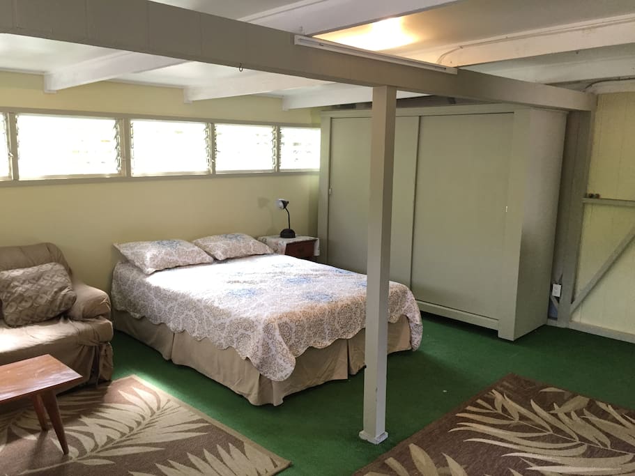 Sleeping area with large storage armoire