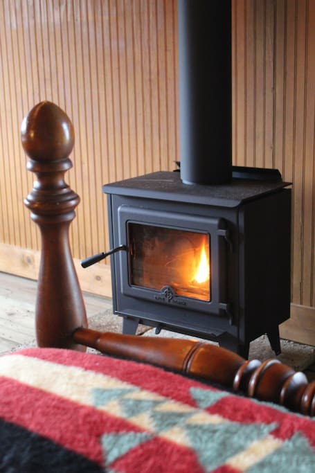 SMELL THE WOODSMOKE!! New wood stove is in, placed between the two twin beds. Fall asleep to the flicker of the fire!