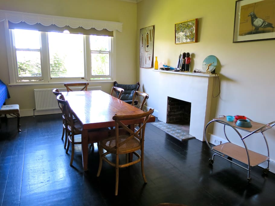 Front of house dining room, with open fire and city views