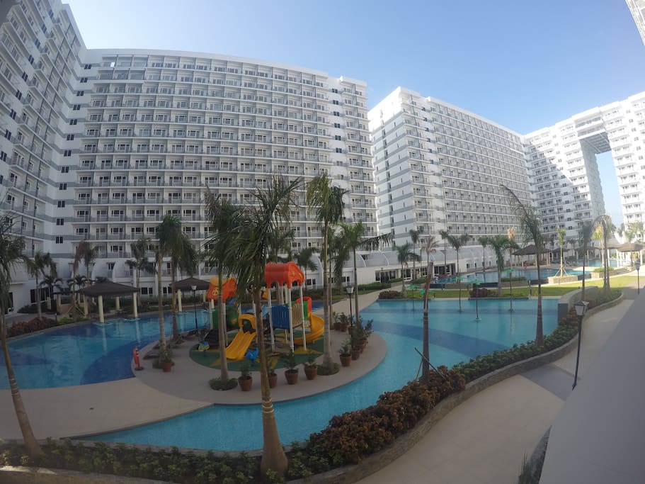 View from the Balcony area. Located in 2nd level of Tower C, the only level having this huge balcony. Easy to watch your kids swimming and playing directly from the balcony.