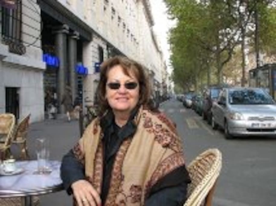Although this picture taken of me at a cafe in Paris is outdated, it remains one of my favorite memories.