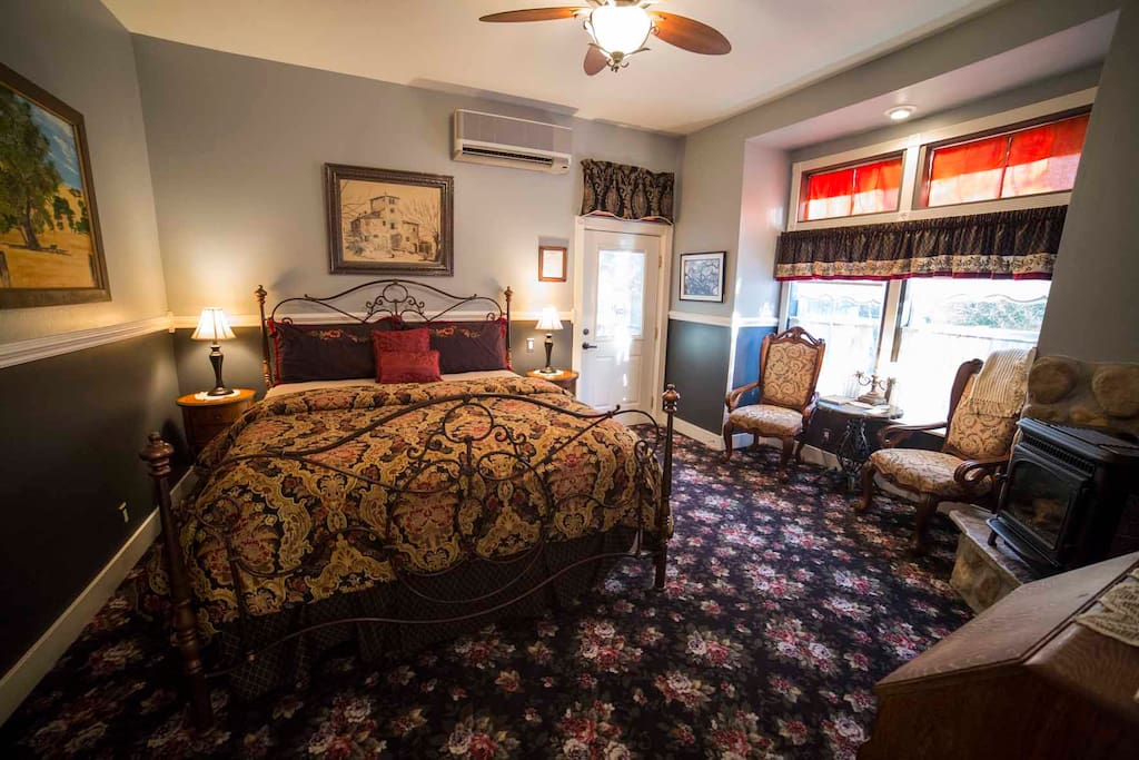 Beckmen features a California King size bed, gas fired wood stove, and sitting area along with a private entrance